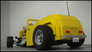Illustration for article titled More LEGO madness... AFOL designs/builds coolest hot-rod yet...